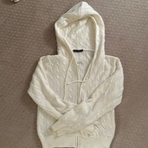 Knit zip up sweater from Brandy Meville. OS and cream colored